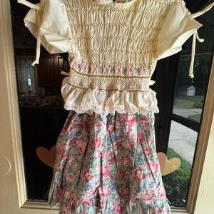 Polly Finder’s Floral Smocked Dress with Lace Details